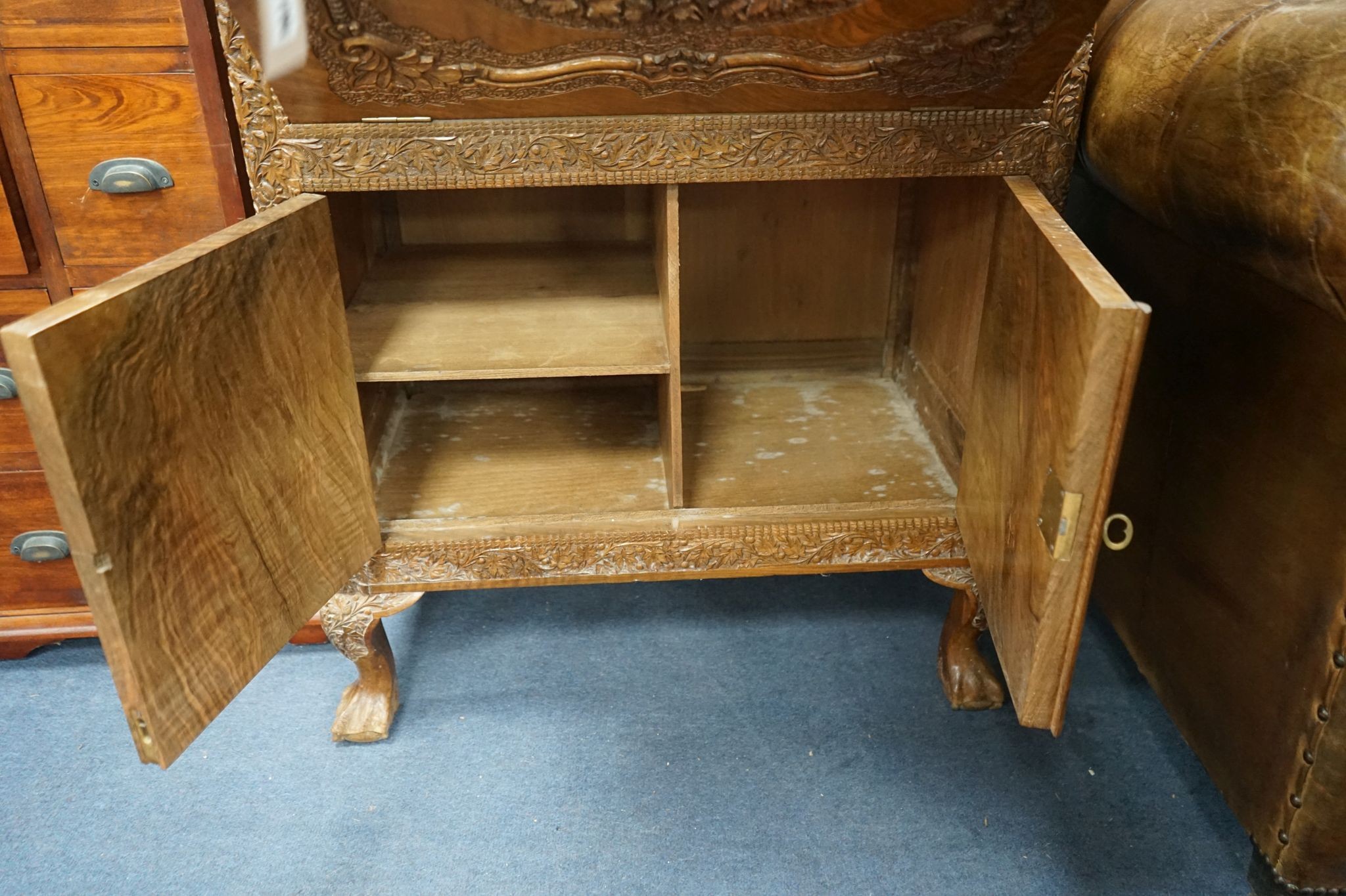 A Kashmiri carved hardwood cocktail cabinet, width 67cm, depth 42cm, height 96cm